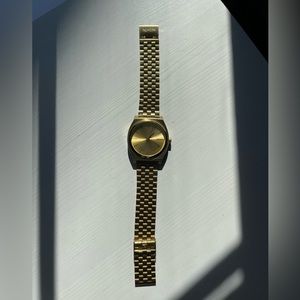 Nixon gold watch